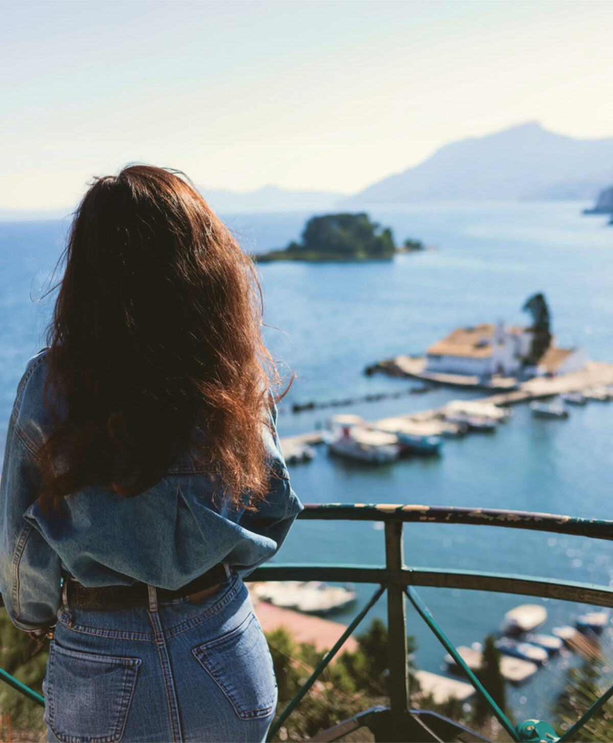 Dimitra rent and transfer corfu girl looking at the view